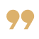 Stylized gold quotation marks icon